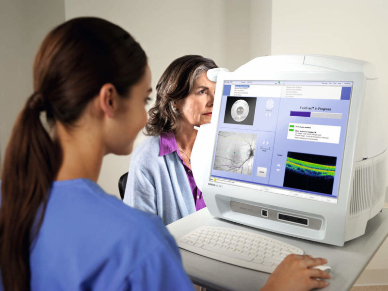 Optical Coherence Tomography Imaging Machine | Patient Having Eyes Imaged
